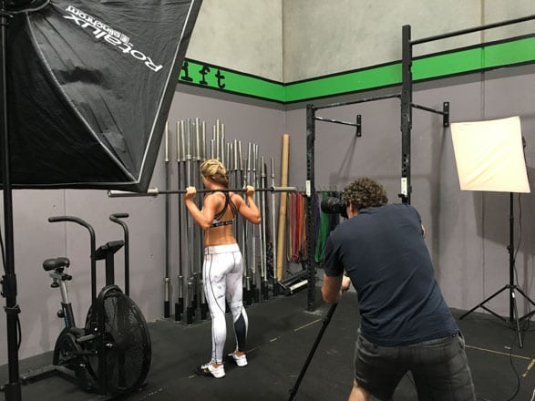 Commercial photographer Jesse Taylor at work on a fitness shoot