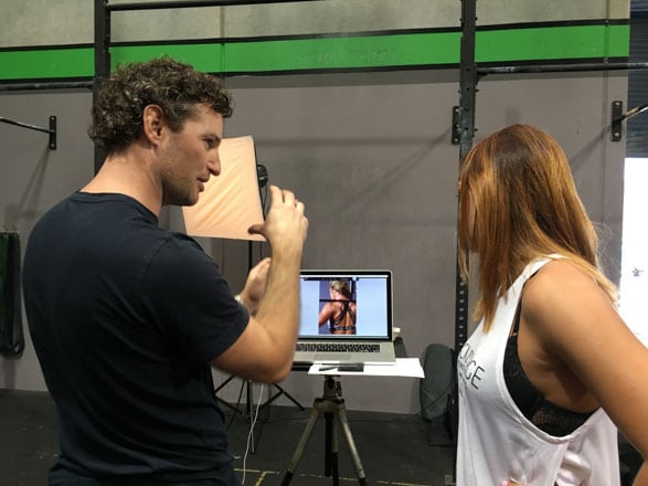 Commercial photographer Jesse Taylor at work on a fitness shoot